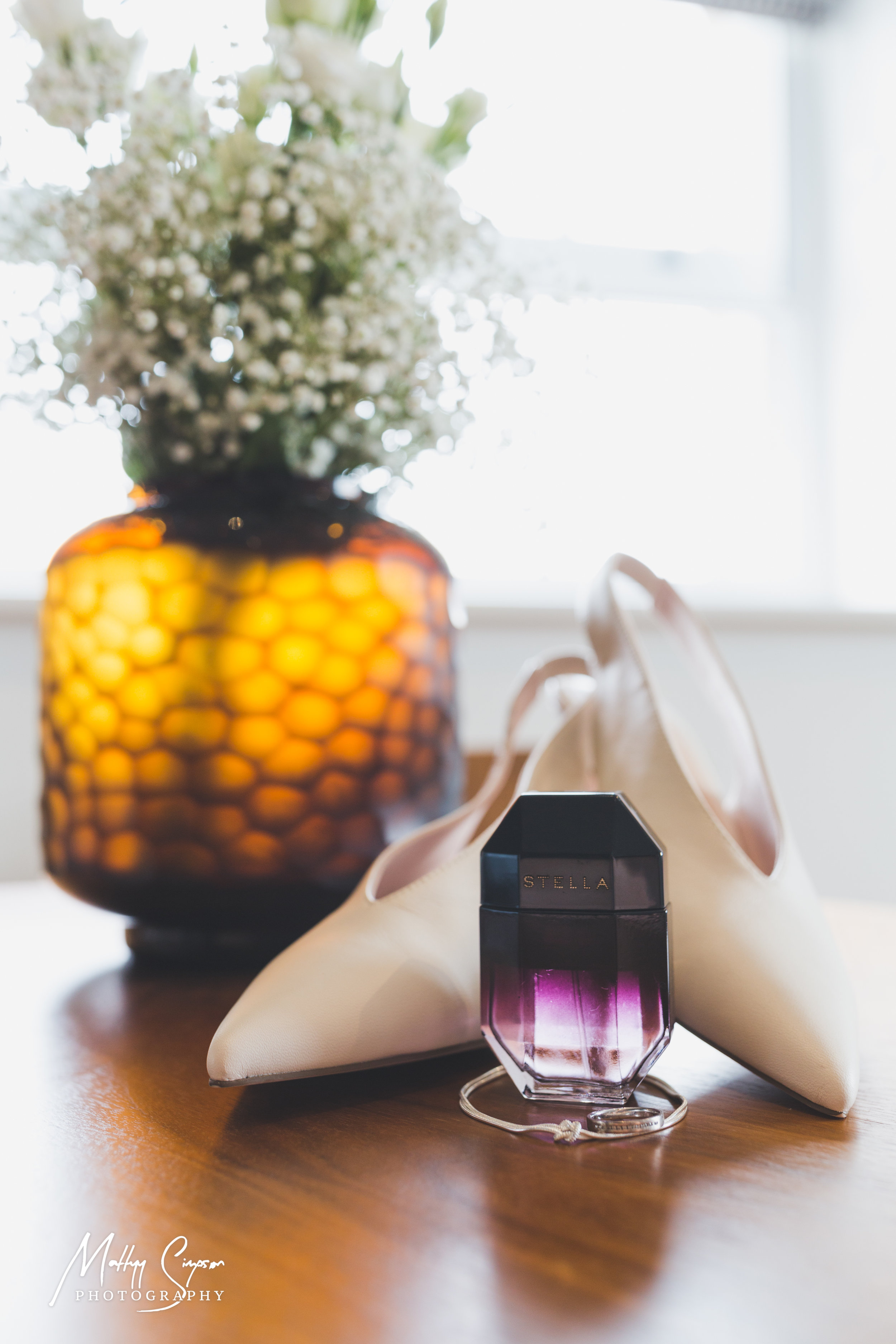 Perfume, wedding shoes, bracelet, engagement ring & flowers