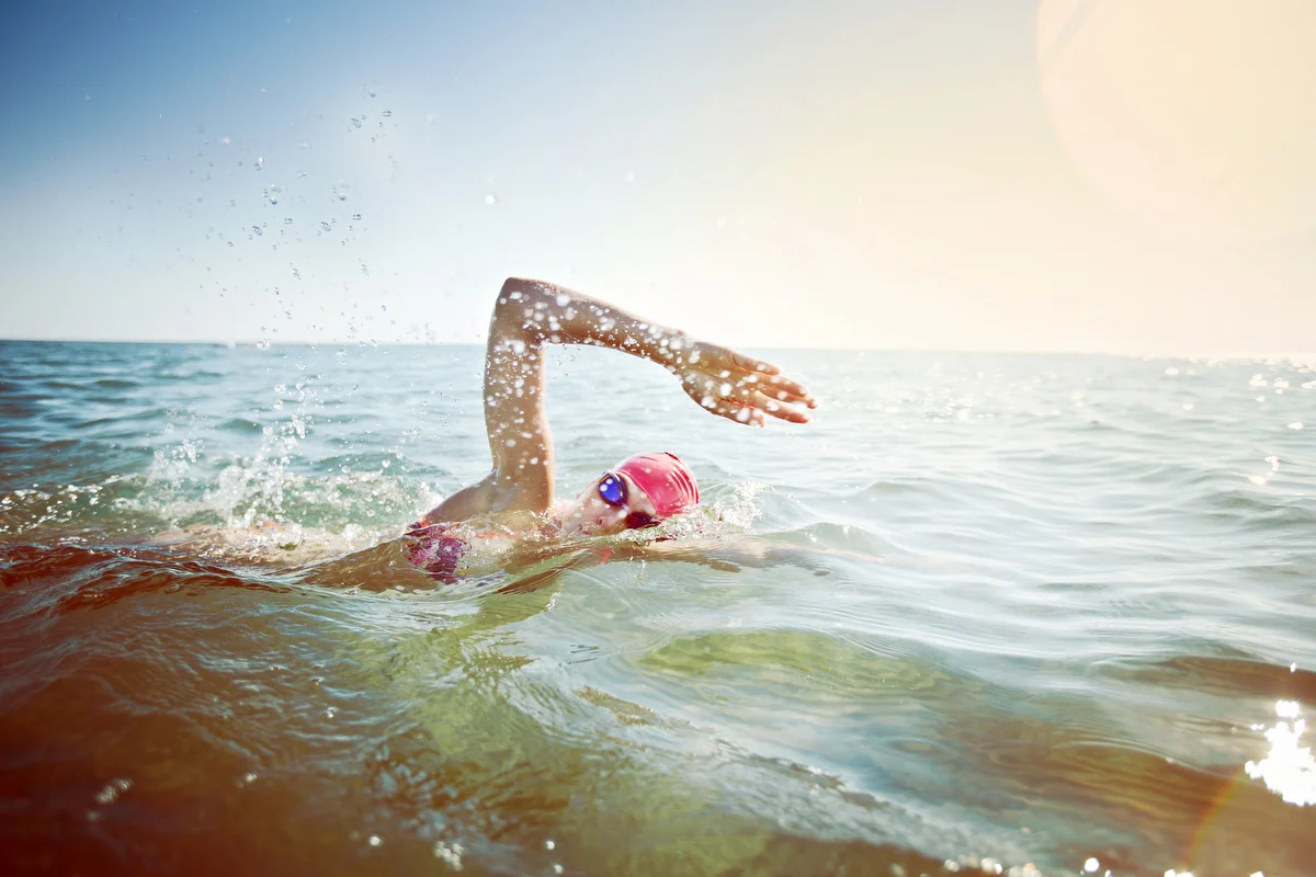 Action shot of Joanne Sloat swimming in Lake Huron during her training for her Tri Athlete event for Fitness Magazine 