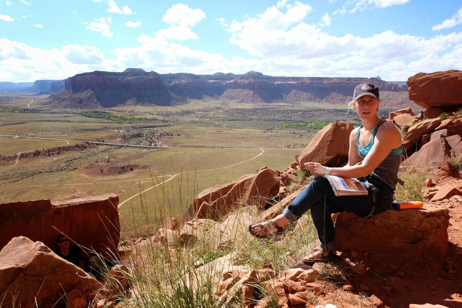 Laura Stade + guidebook, Indian Creek Utah Fall 2013.