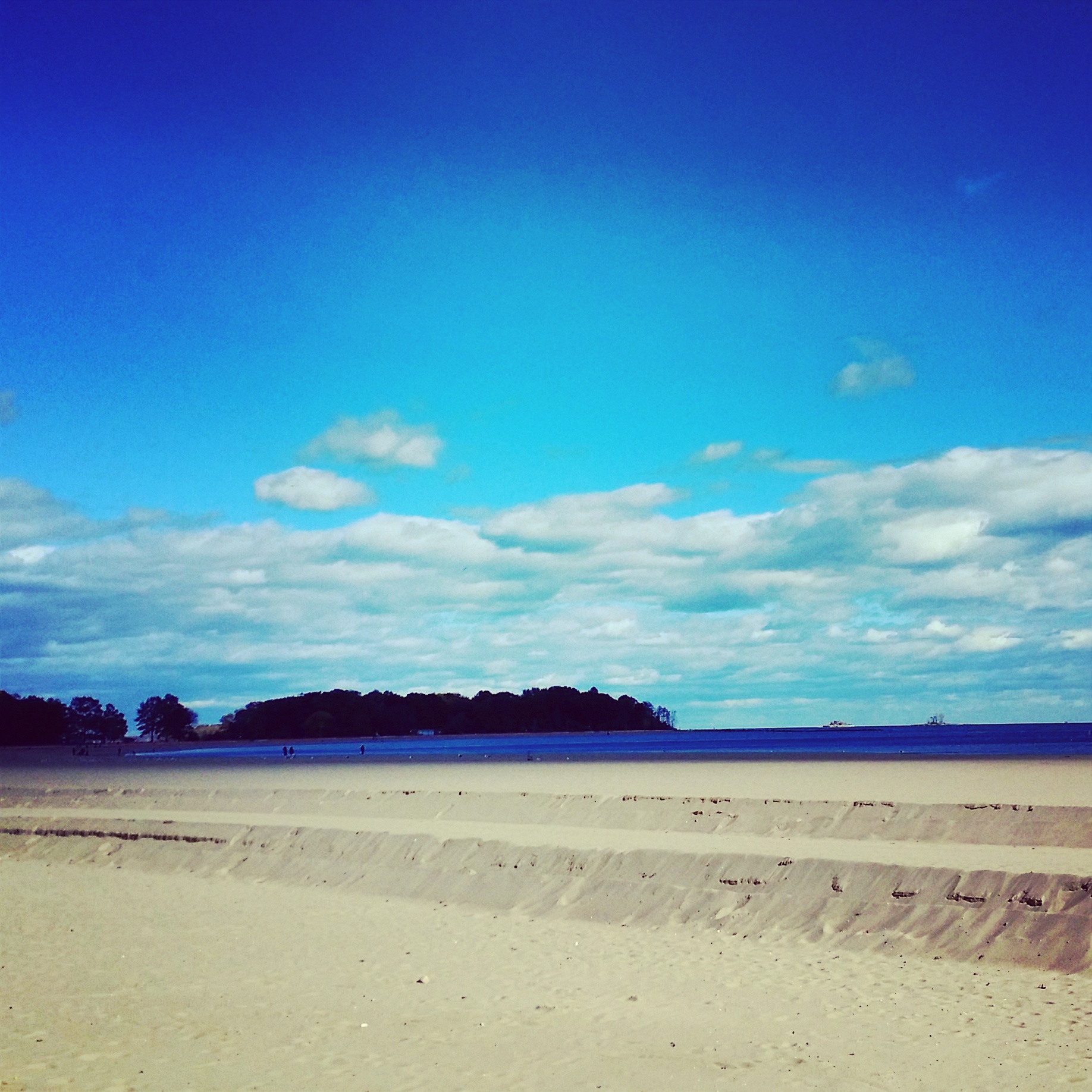 Exploring Orchard Beach during the Tour de Bronx