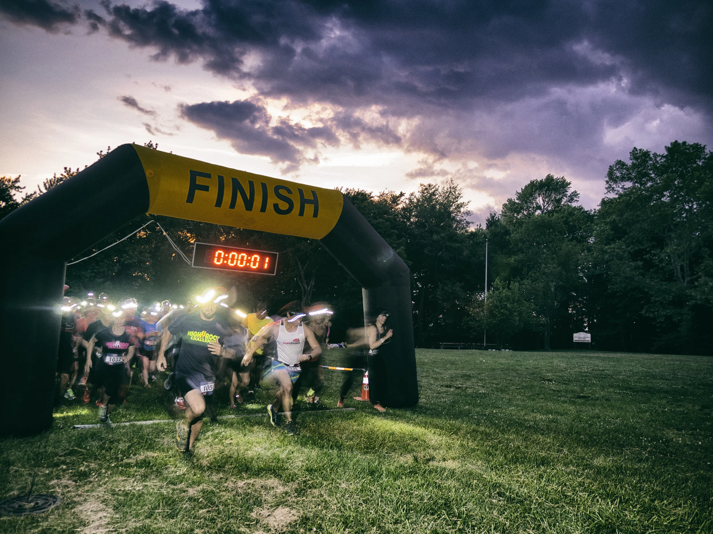 A perfect capture of the start of the 5k Headlamp Trail Race by Tom O'Hare.