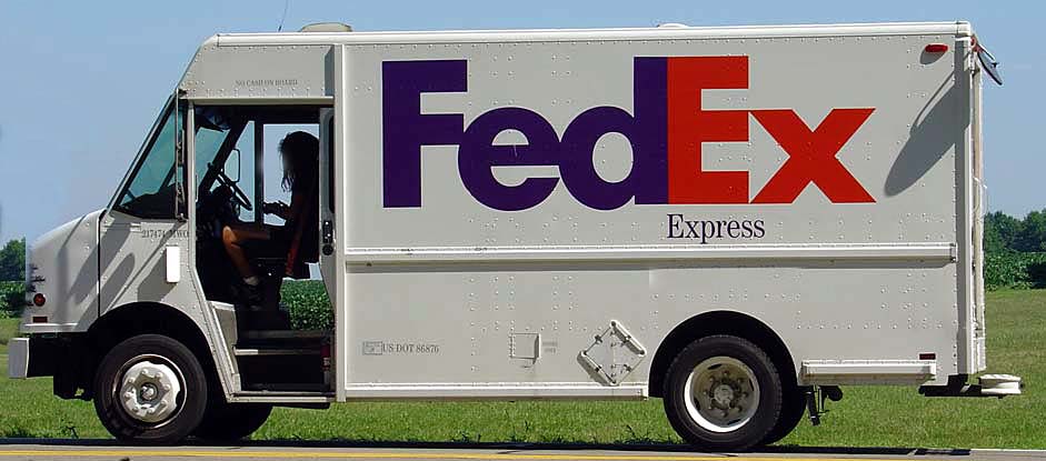 Logo implementation on a company truck (Source: http://blog.pixellogo.com)