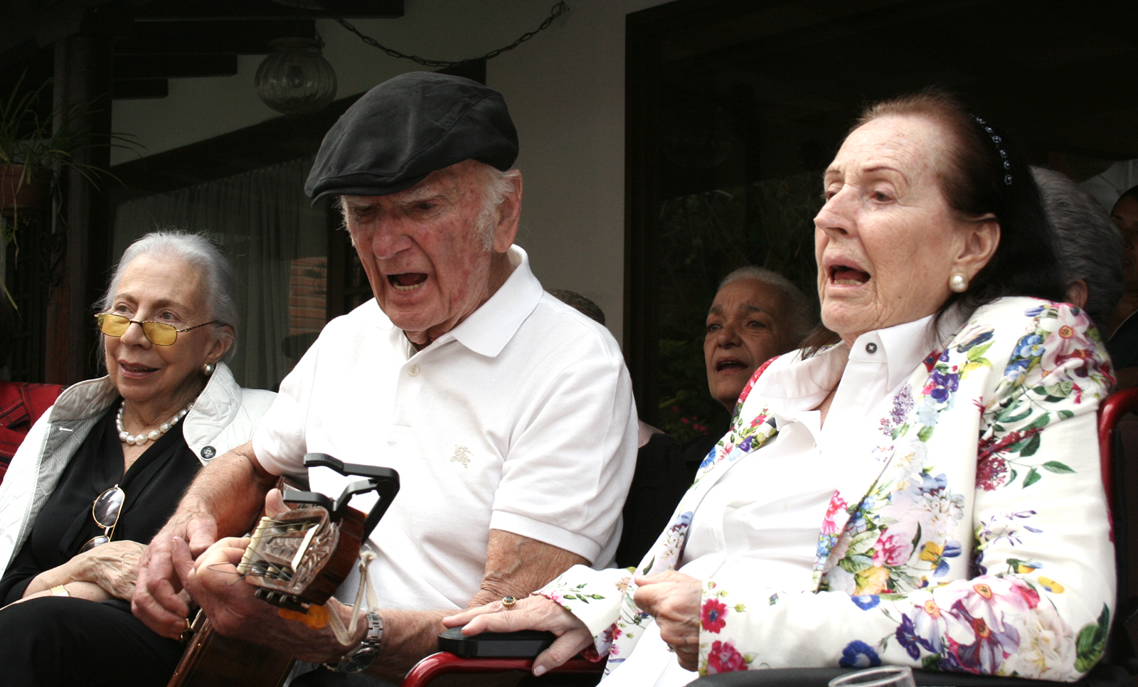 El Papá Cabal at his 90th birthday. To his left (our right), my Grandma Blanca Lúz.