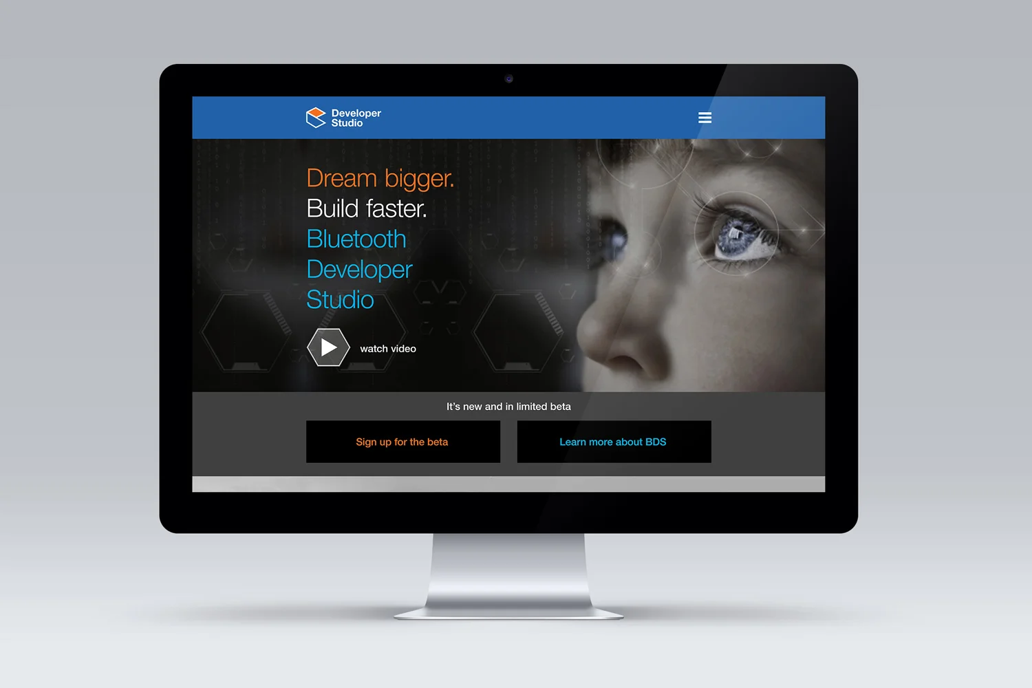 Concept website home landing page for the Bluetooth Developer Studio. Image of a desktop showcasing a hero graphic, links to a video, and links to more information.