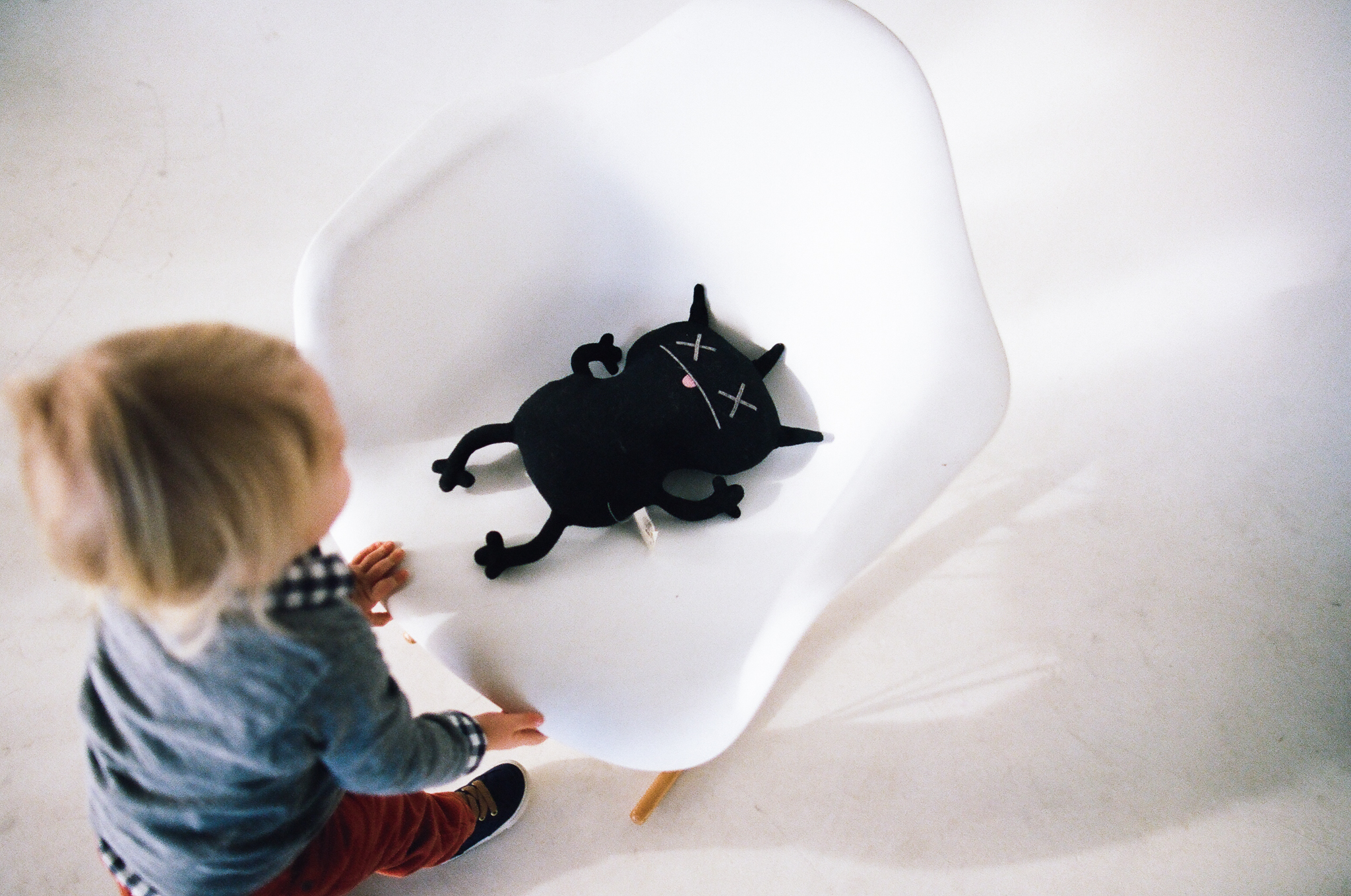 Child and monster doll in a Minneapolis photo studio