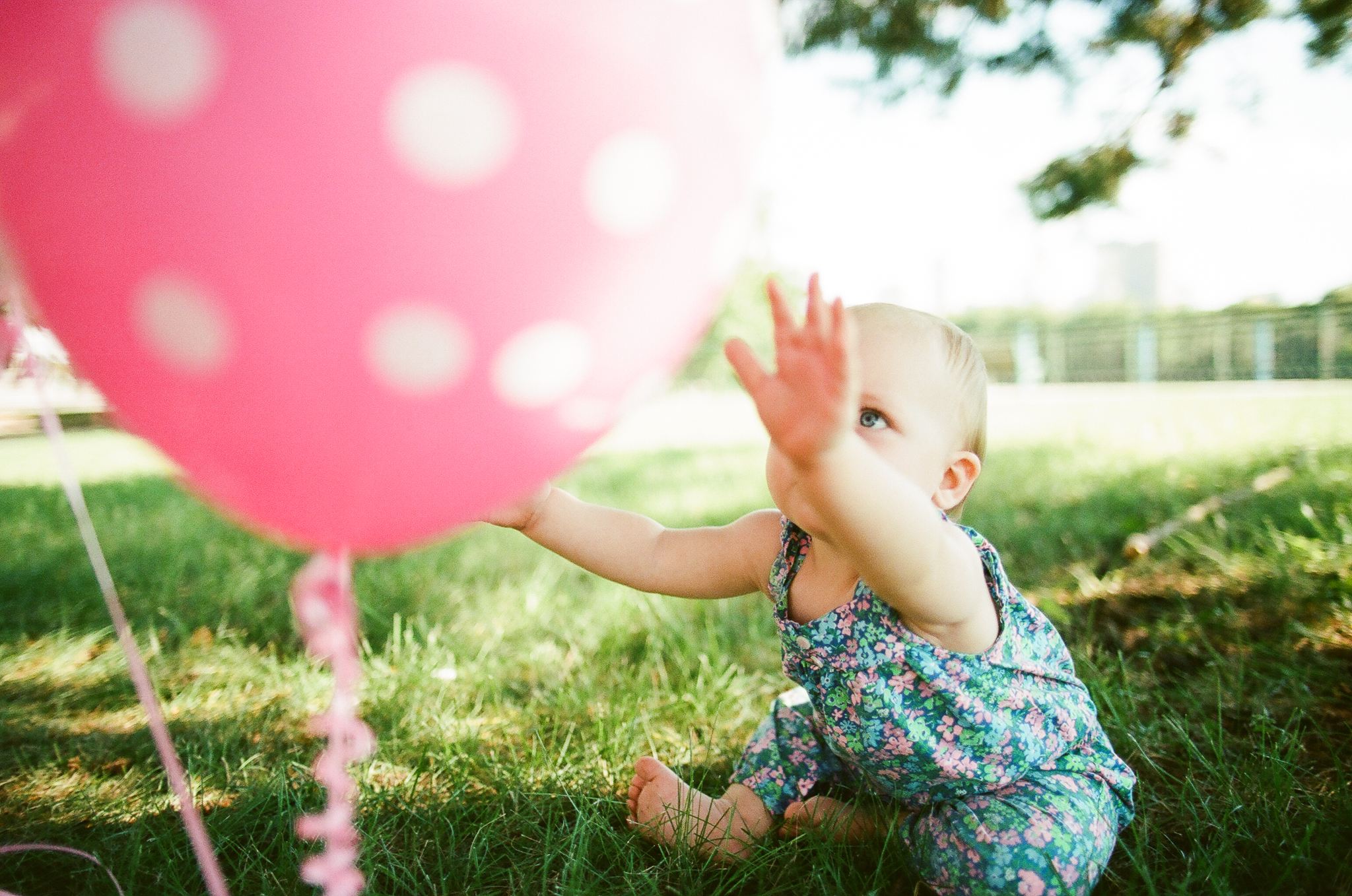 Child with Balloons on her first birthday