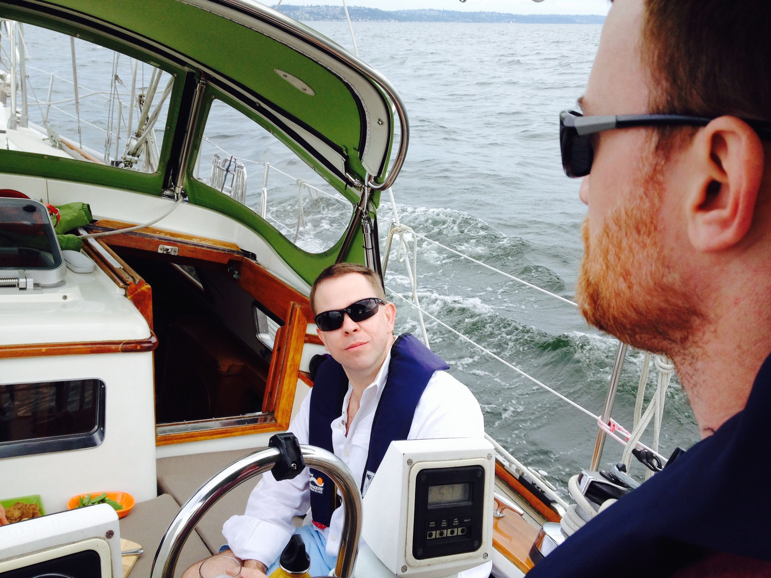 Jon at the helm, Chad at the snacks.