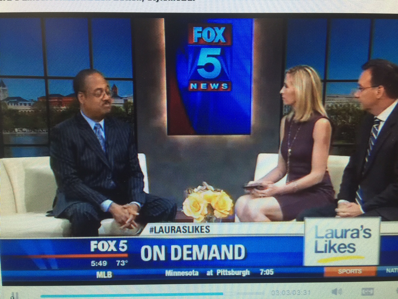 Anchor, Mrs. Laura Evans, Fox 5 News with Enise jewelry.