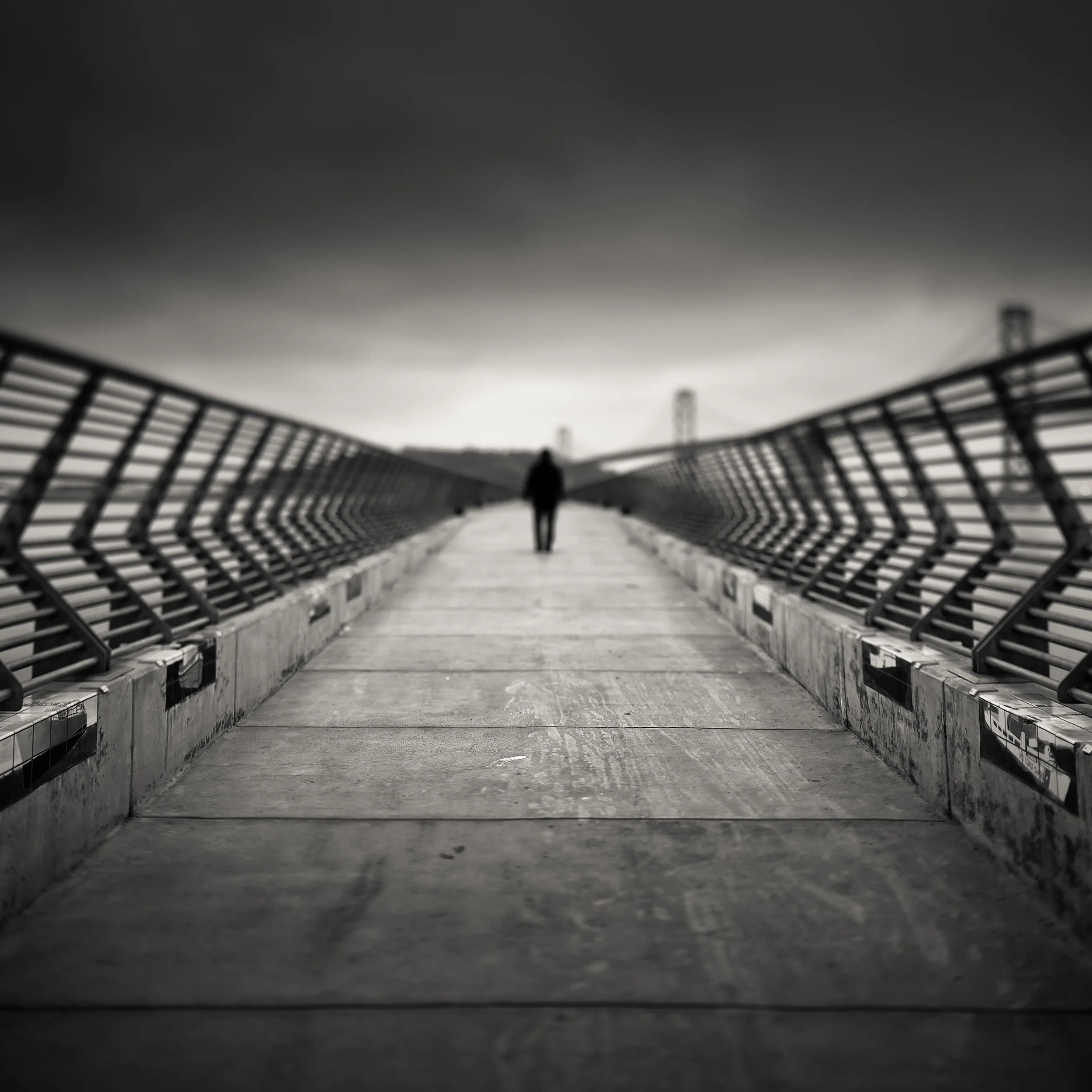 San Francisco Pier 14 black white figure toll collector moody ominous
