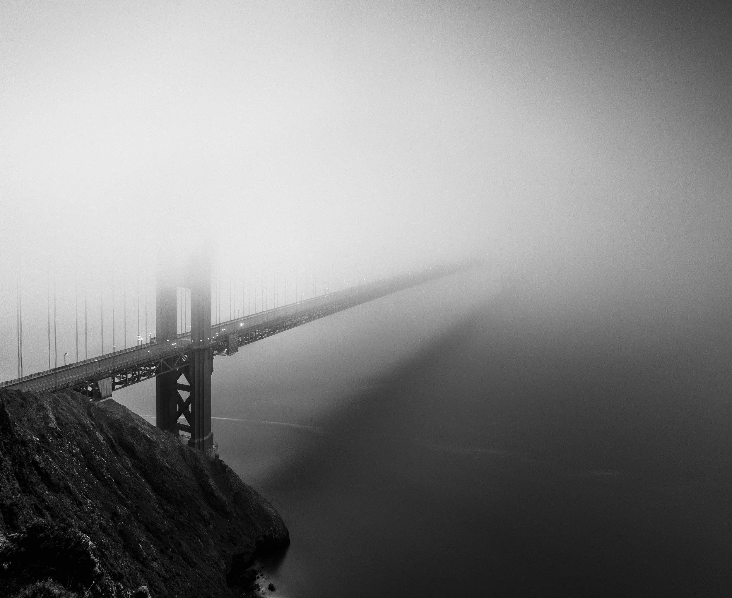 Sausalito black white golden gate bridge fog suspended