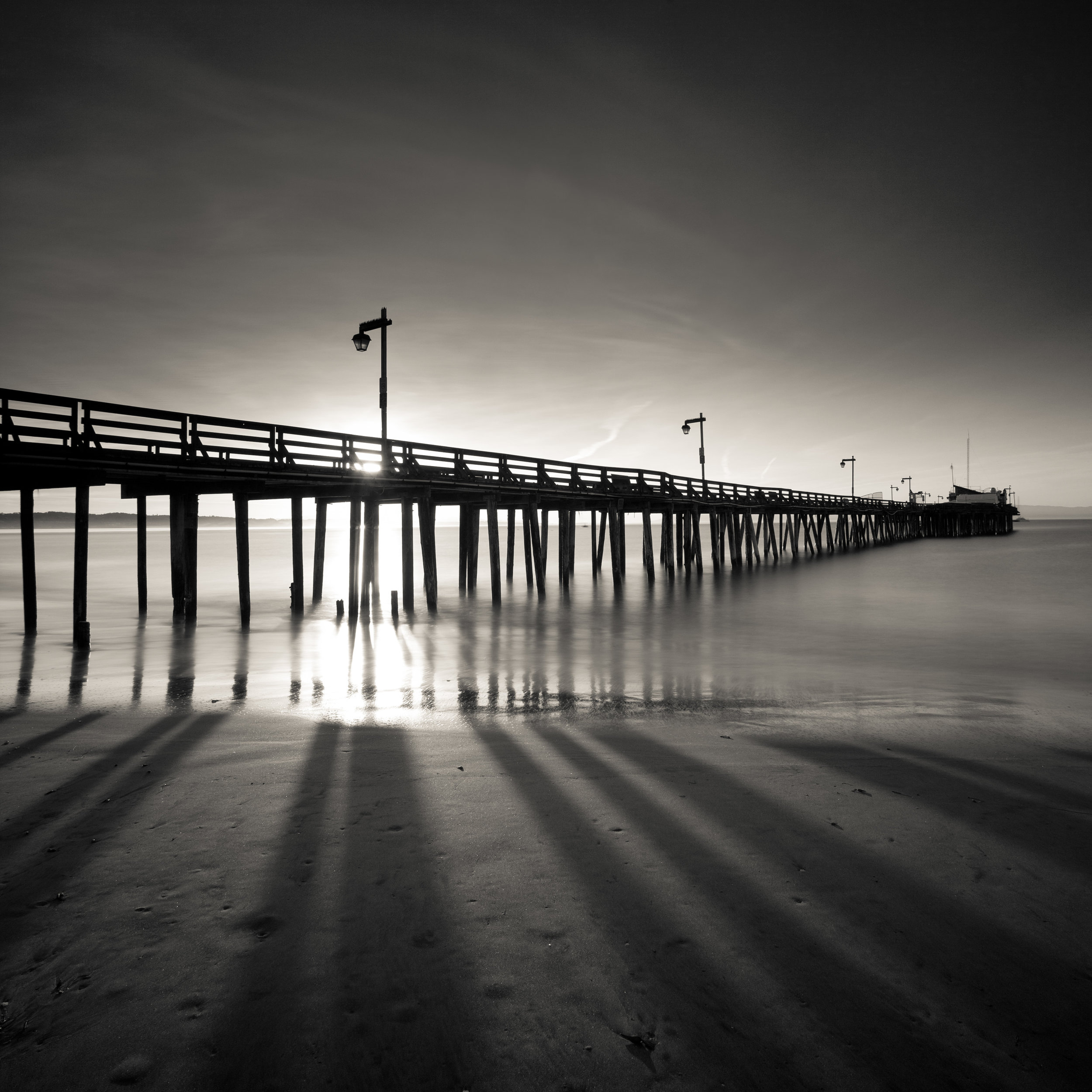 Capitola black white sunrise pier morning shadows beach