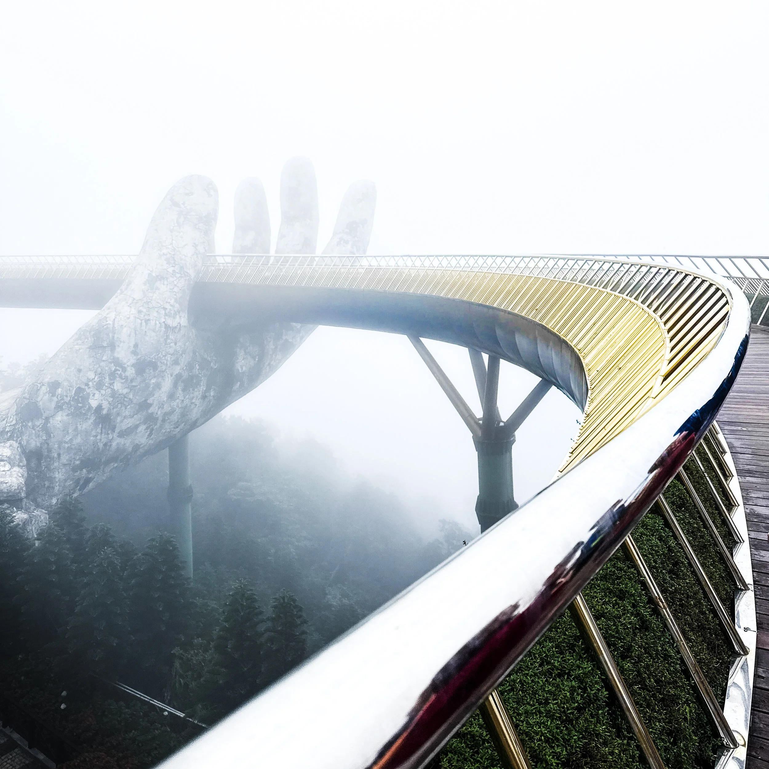 golden bridge ba na hills foggy vietnam god hand