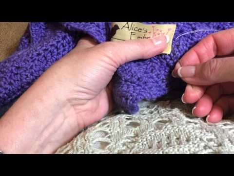 Click the above picture to see a tutorial for sewing on one of our unique Alice's Embrace labels. We have sewn on hundreds, so we thought we would share our method of sewing a label on a knitted item. It is not a professional video, just Diane showing you how she does it and thought you would like to see her method that works nicely.