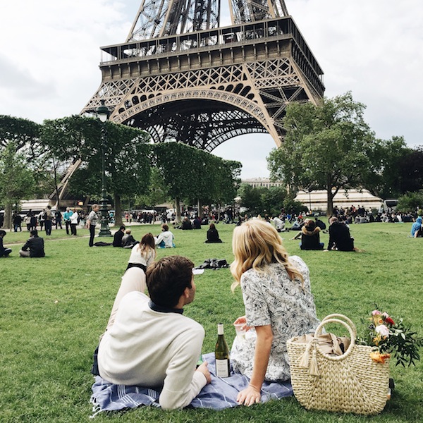 One of our favourite things is discovering perfectly captured travel photos, and these shots by Lauren Wells convey the nostalgia of a spring picnic in Paris beautifully. From the faded colours and overcast skies to the print of her dress and wicker…