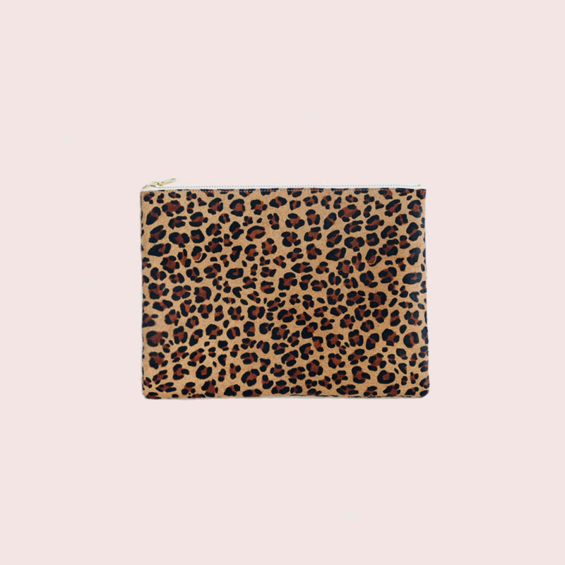 The Saint-Tropez Zip Pouch in eternally chic leopard: use it as a clutch with a ruffled little white dress and espadrilles for summer nights, or as a travel case for bottles of lotions and perfume or as a pencil case at the office ...+ shop now