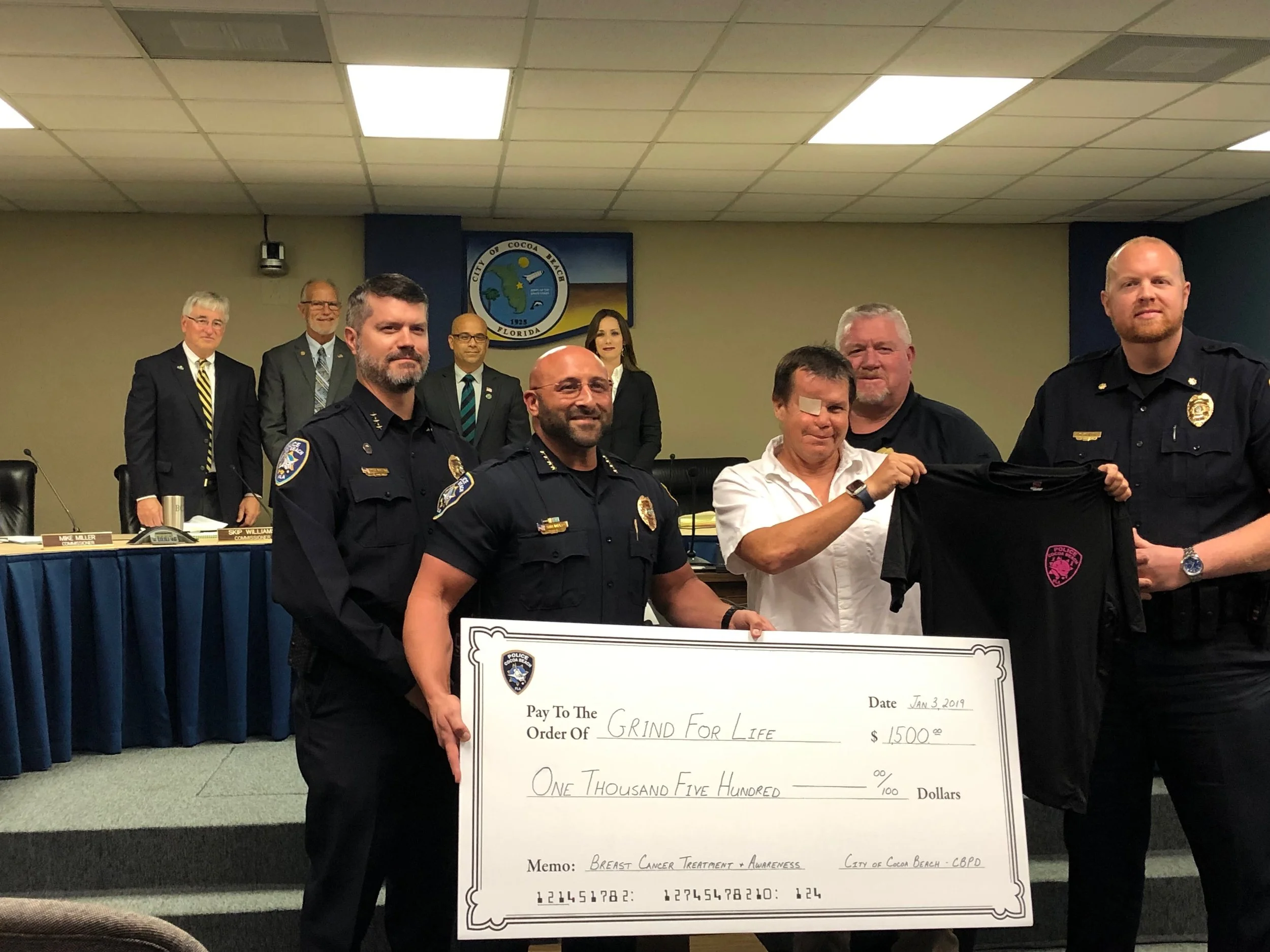 Cocoa Beach Police Making A Very Nice Donation at Commission Meeting Jan 3rd 2019