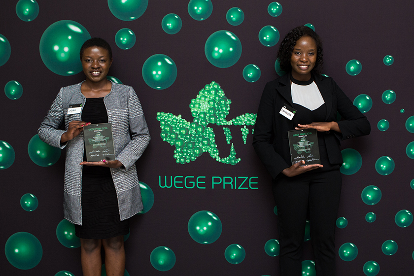 KYCE team members Lydiah Mpyisi (left) and Lavender Micalo (right) with their 2nd place trophies at the Wege Prize 2016 Awards