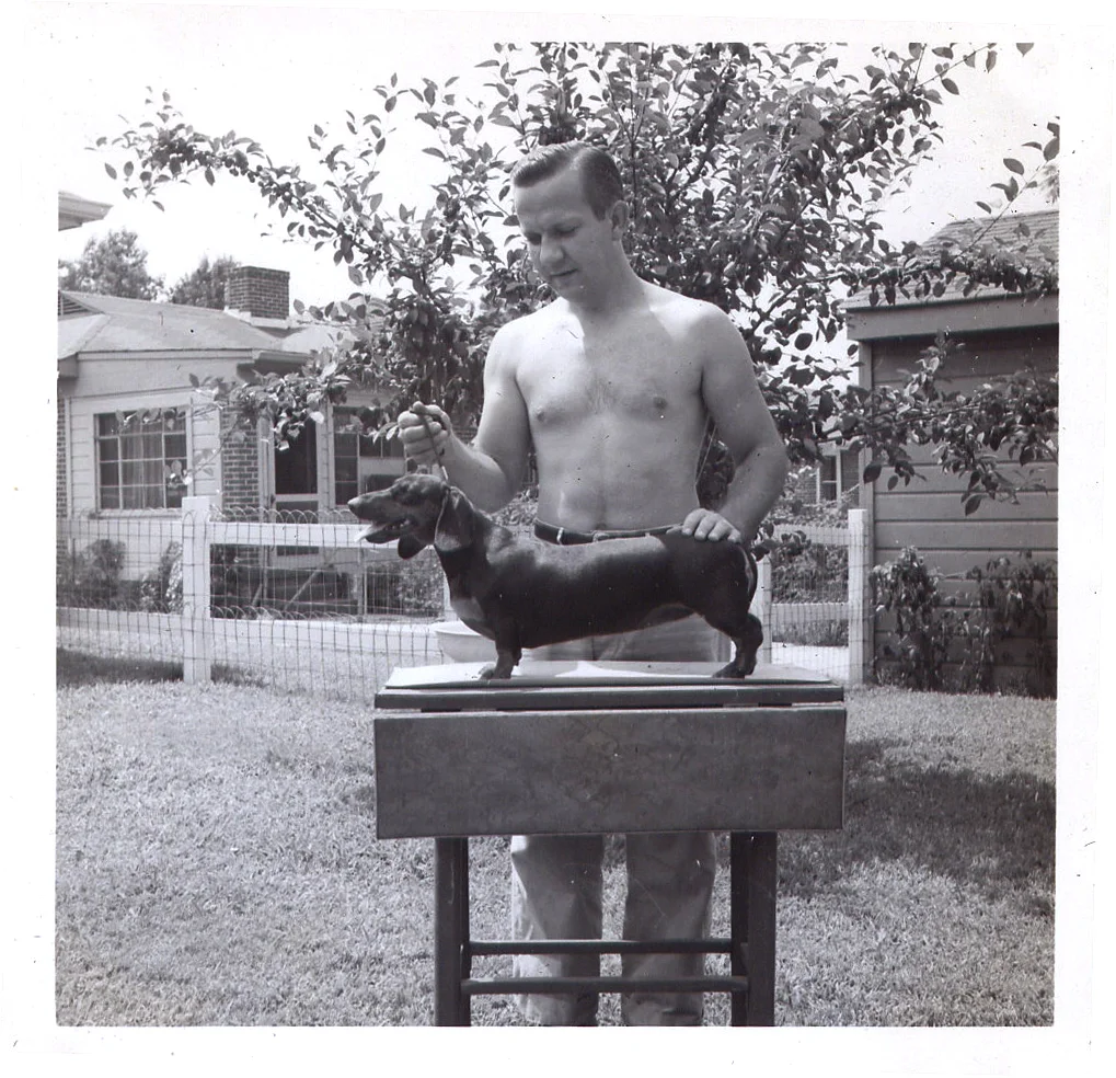 Great Uncle Earl Miller with Katrina the dachshund. (1958)