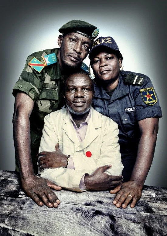 Captain David Kazadi Nzengu (standing left), a military prosecutor; Dr. Désiré Alumeti (seated), a pediatric surgeon at Panzi Hospital; and Honorata Uvoya (standing right), an officer in the Congolese police’s Women and Child Protection Unit. All three trained in best forensic practices with PHR. | Platon for The People’s Portfolio Originally published at physiciansforhumanrights.org.