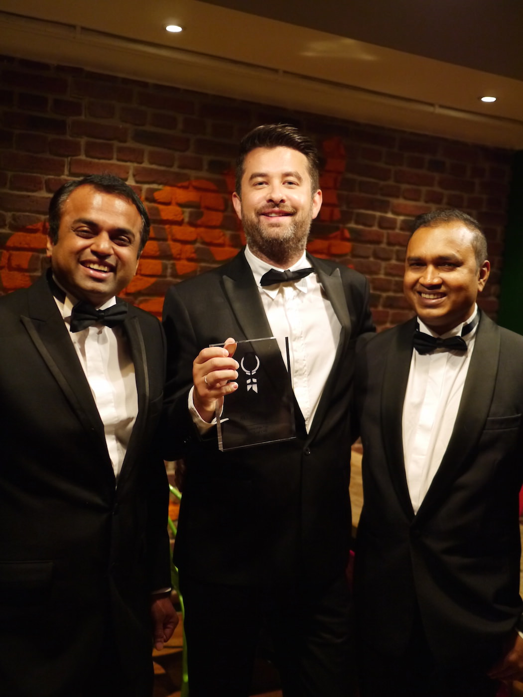 (L to R): Co-owners Kanthi Thamma & Euan Sey, plus Head Chef Gouranga Bera pose with the award