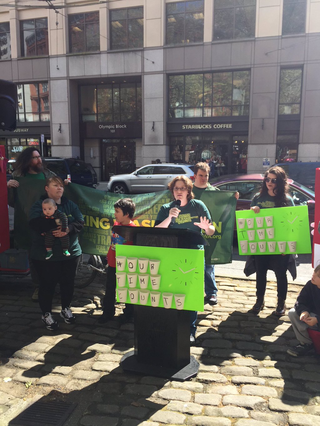 April 14, 2016: Starbucks barista Ilana Greenberg addresses rally for secure scheduling outside downtown Seattle Starbucks store.