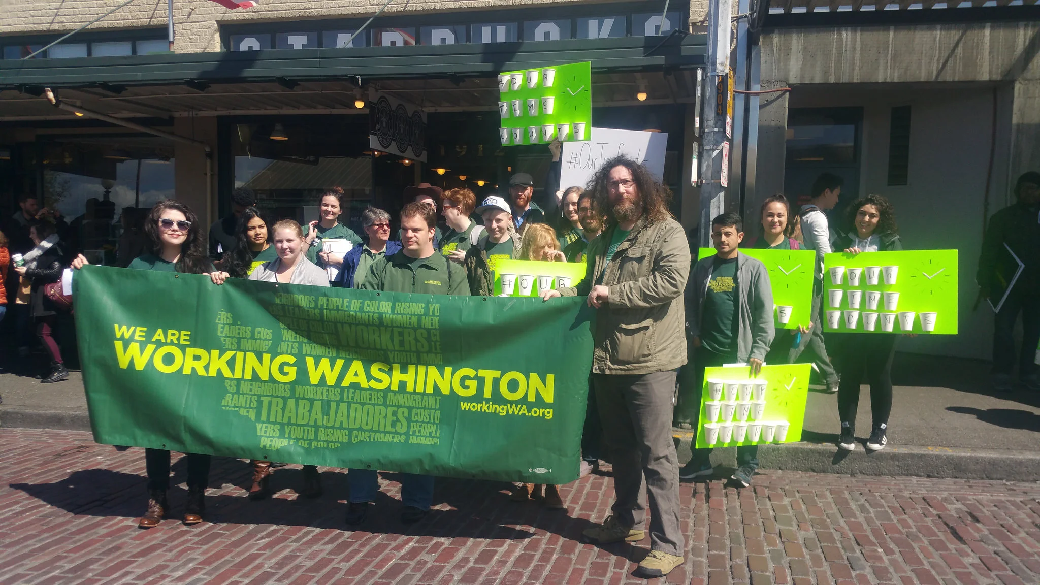 April 14, 2016: Rally for secure scheduling outside "Original Starbucks" in Pike Place Market, Seattle.