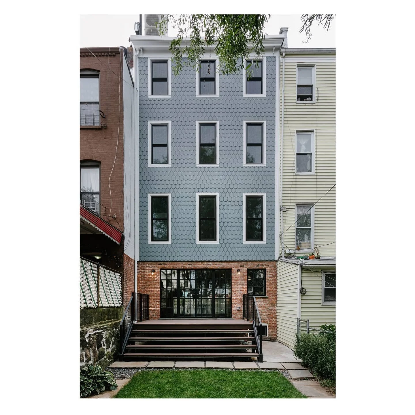 A short list of updates to the Sunset Park Townhouse rear facade: politely removed the carpenter bees from the cornice (and replaced it); installed a functioning gutter and downpipe; corrected a wayward window; opened the kitchen up with new steel do