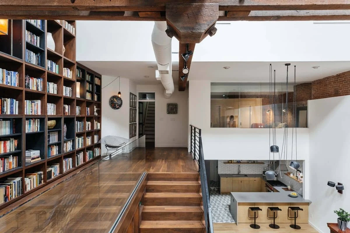 Pavonia Ave. Loft, where the library meets the stair, within sight of the kitchen and bedroom. Photos: @nickglimenakis 

#interior #architecture #details #janekimdesign #renovation #nj