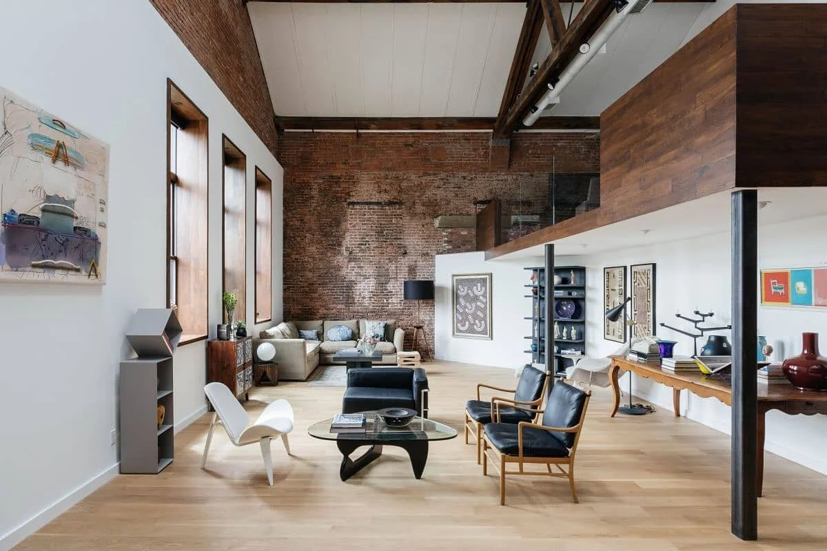 Living room in our Pavonia Avenue Loft: forty-five-foot ceilings with light pouring in. Photos @nickglimenakis 

#interior #architecture #details #janekimdesign #renovation #nj #industrial #loft #livingroom