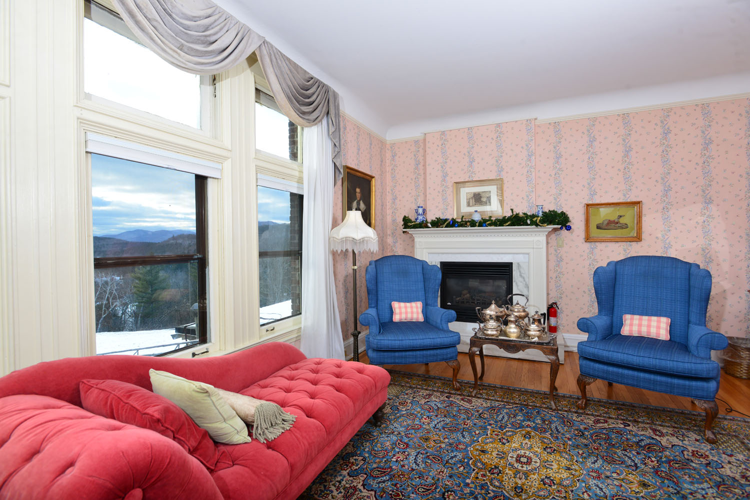Room 6 fireplace and winter view.jpg