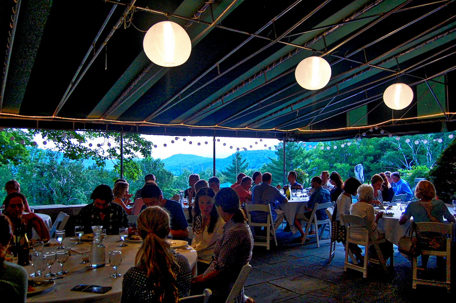 Dusk_under_awning_rehearsal_dinner.jpg