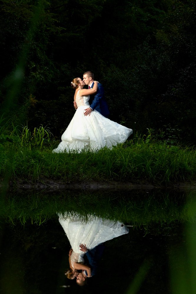 Kiss by the pond.jpg