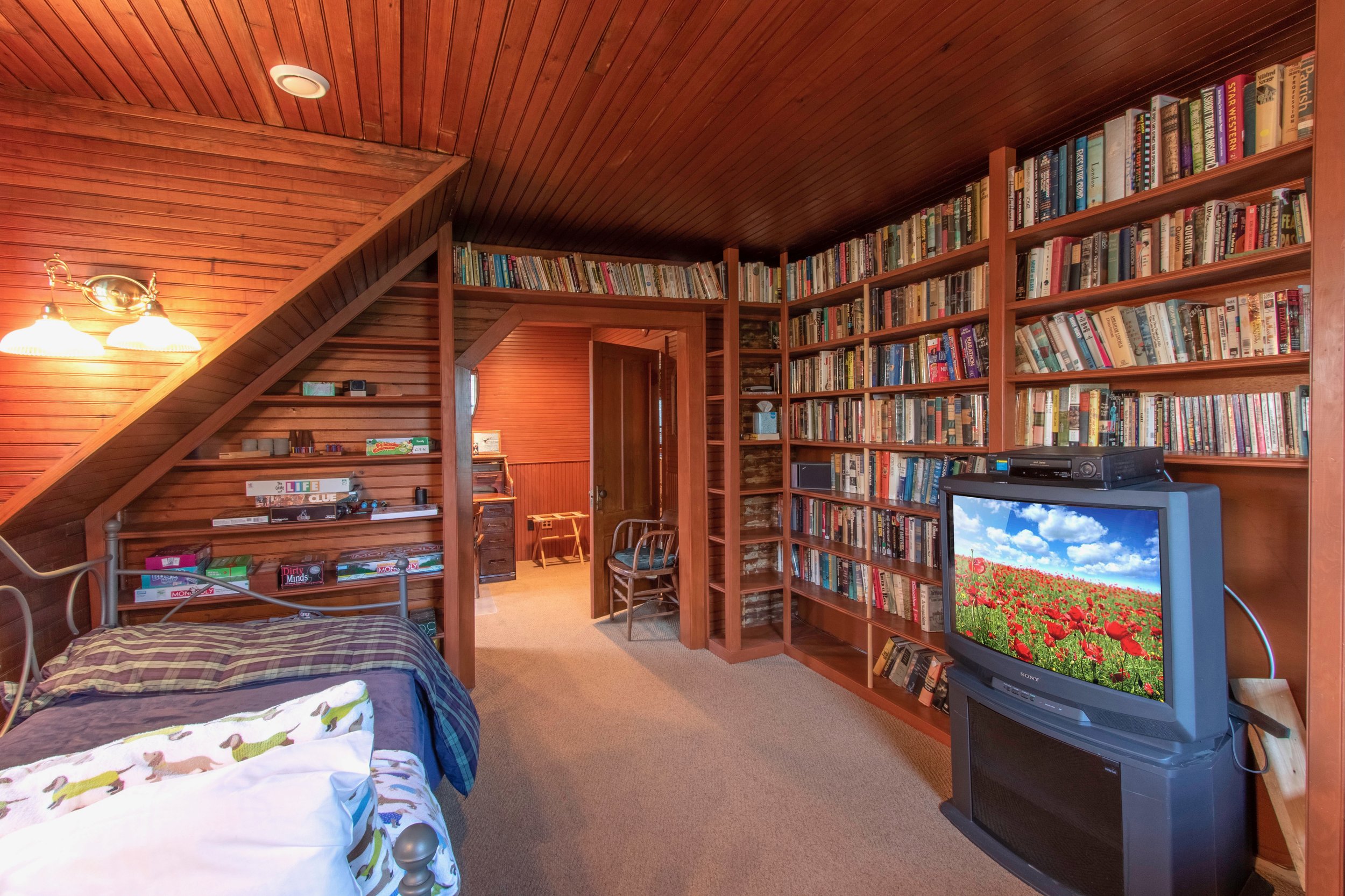 Twin beds library into office Carriage house.jpeg