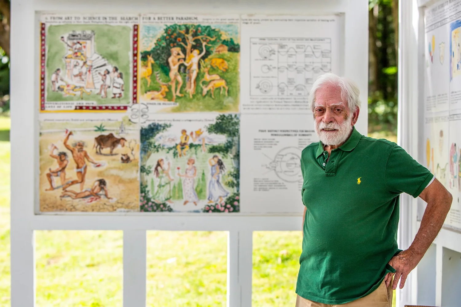 a person standing in front of a poster