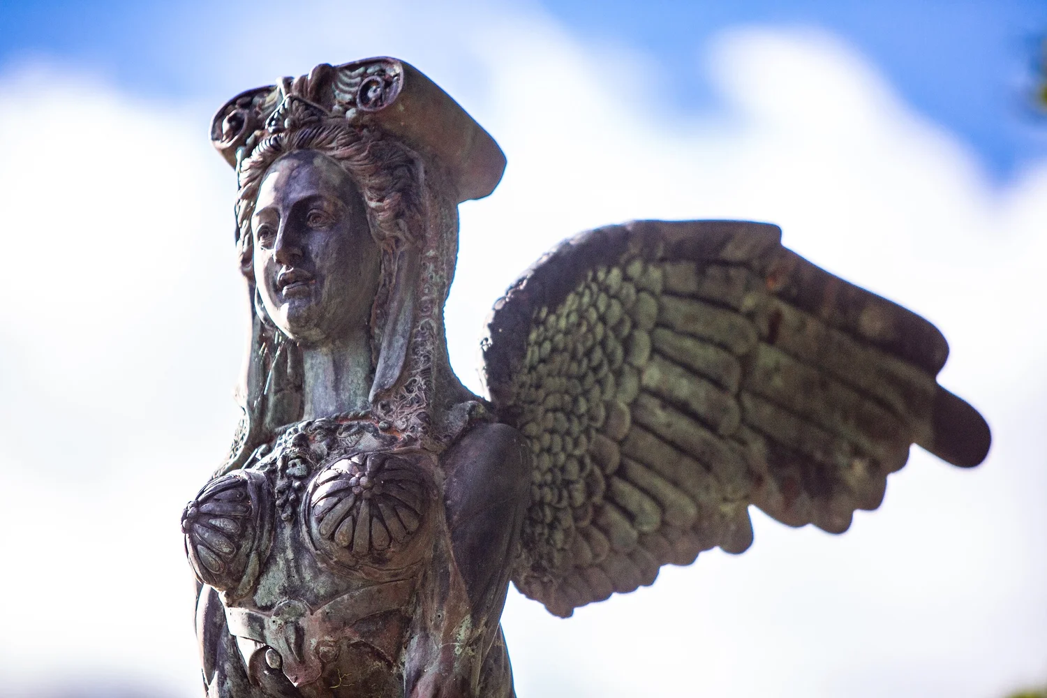 a statue of a person with wings