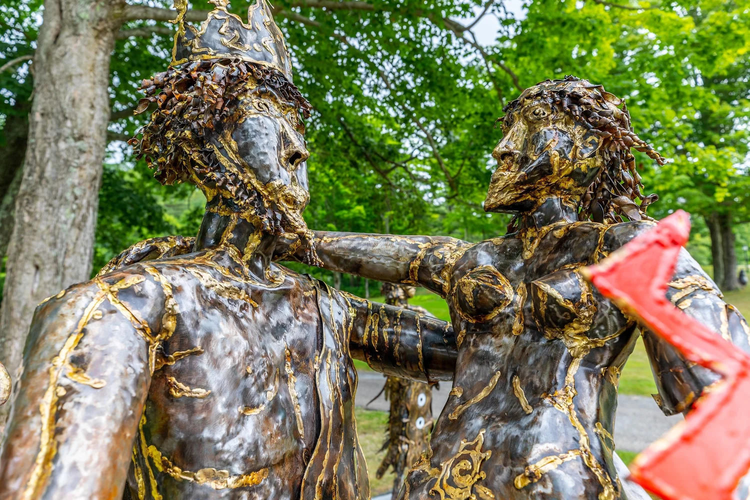 a statue of a person holding a gun