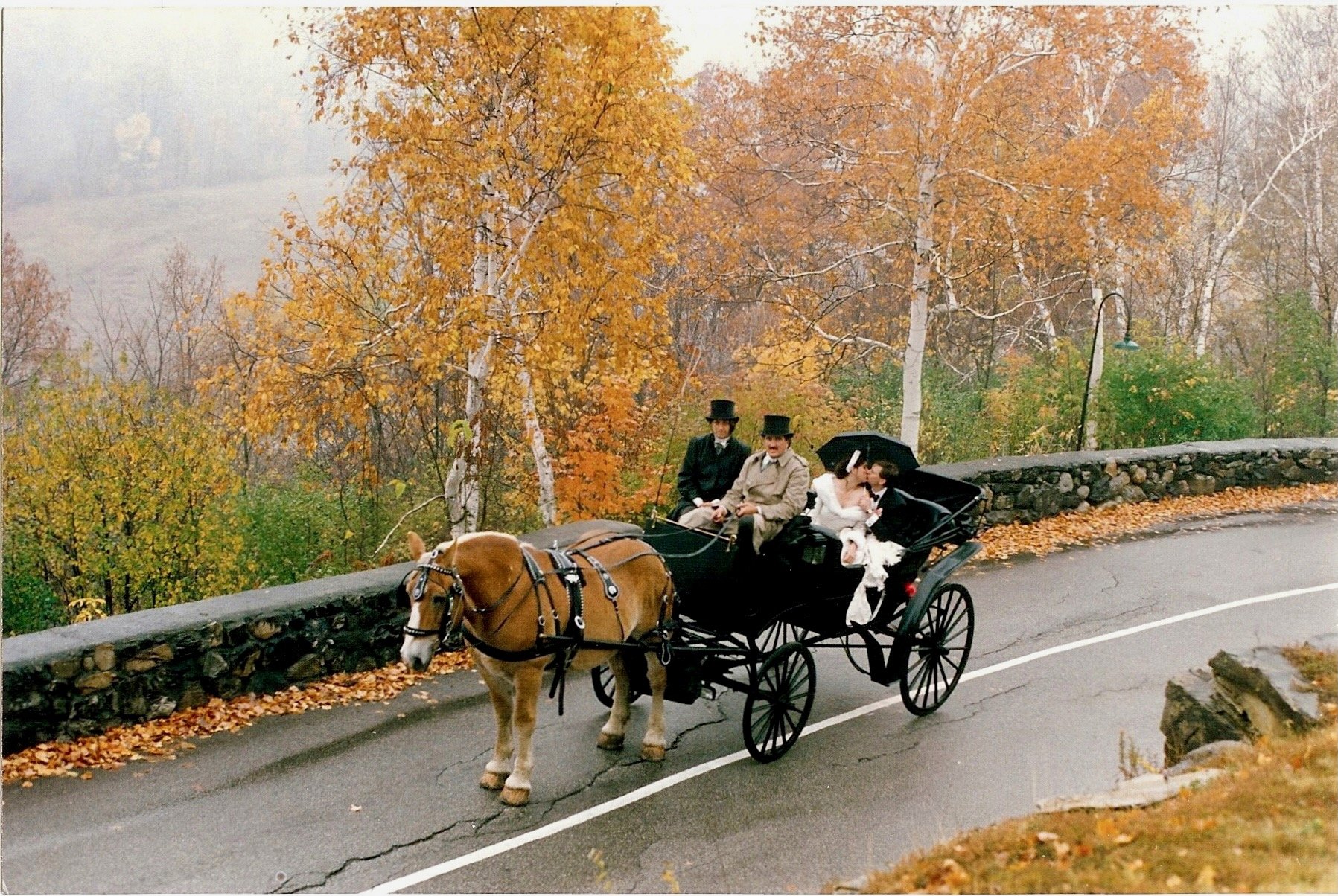 Fall Bride Groom Carriage Wilburton Inn Drive.jpeg