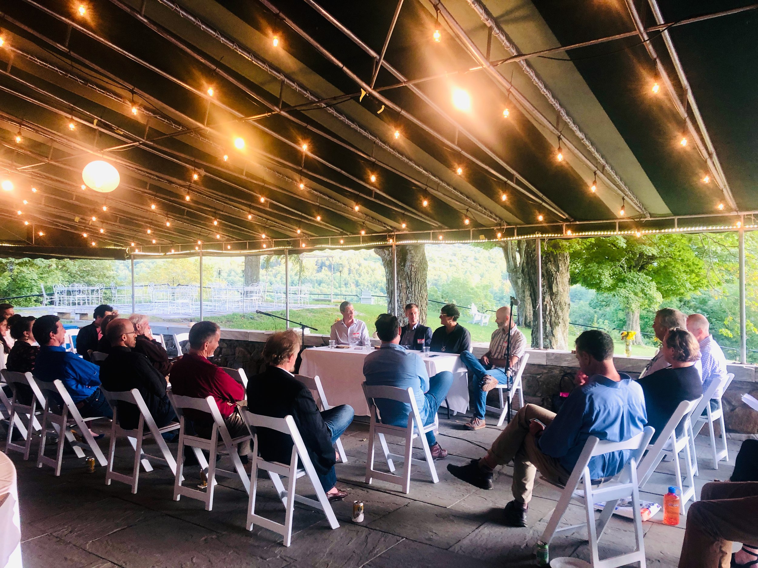 Conference beneath the awning.jpeg