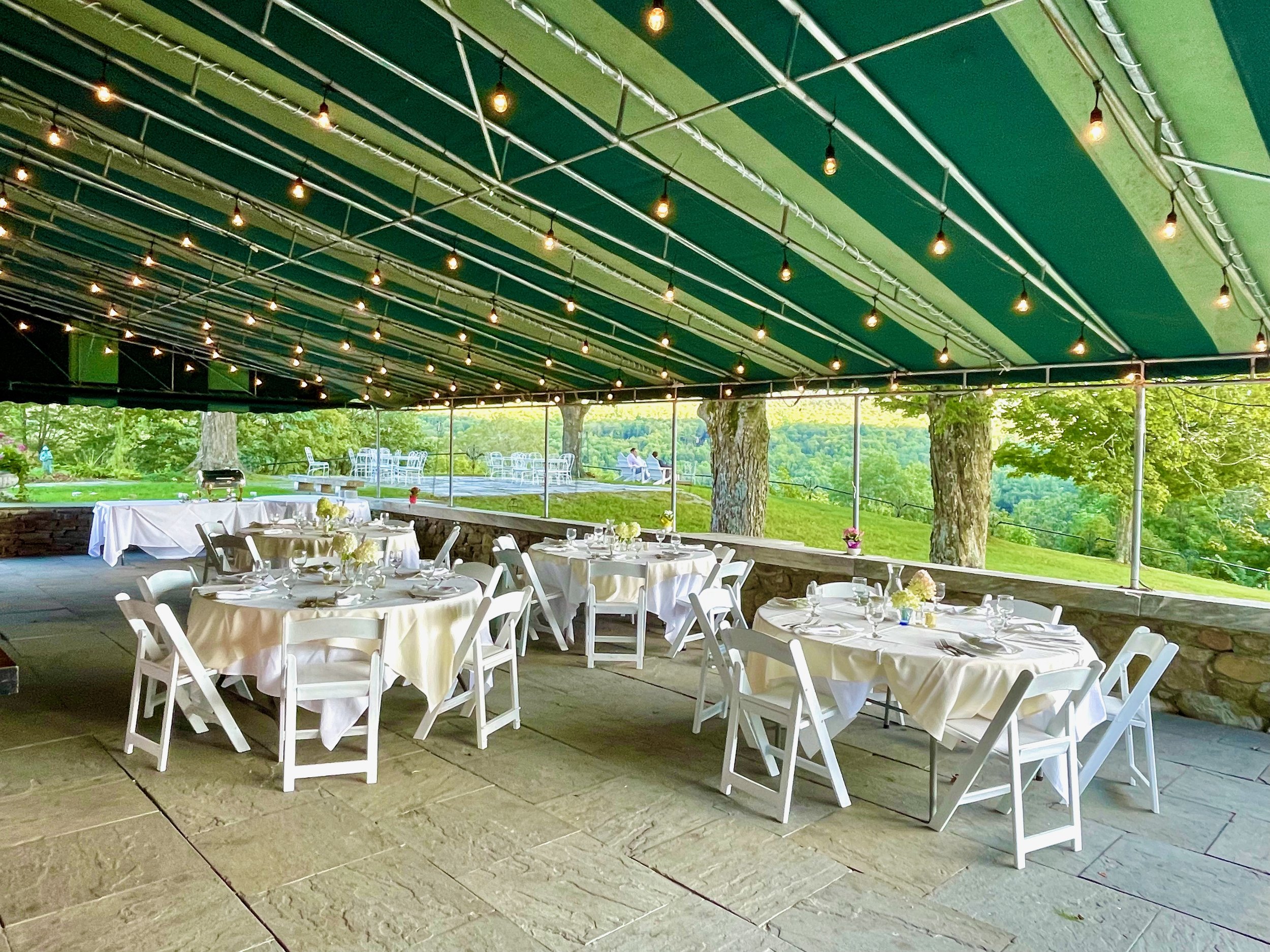 Summer_rounds_Awning_The_Wilburton_Dining_Round_Tables.jpeg