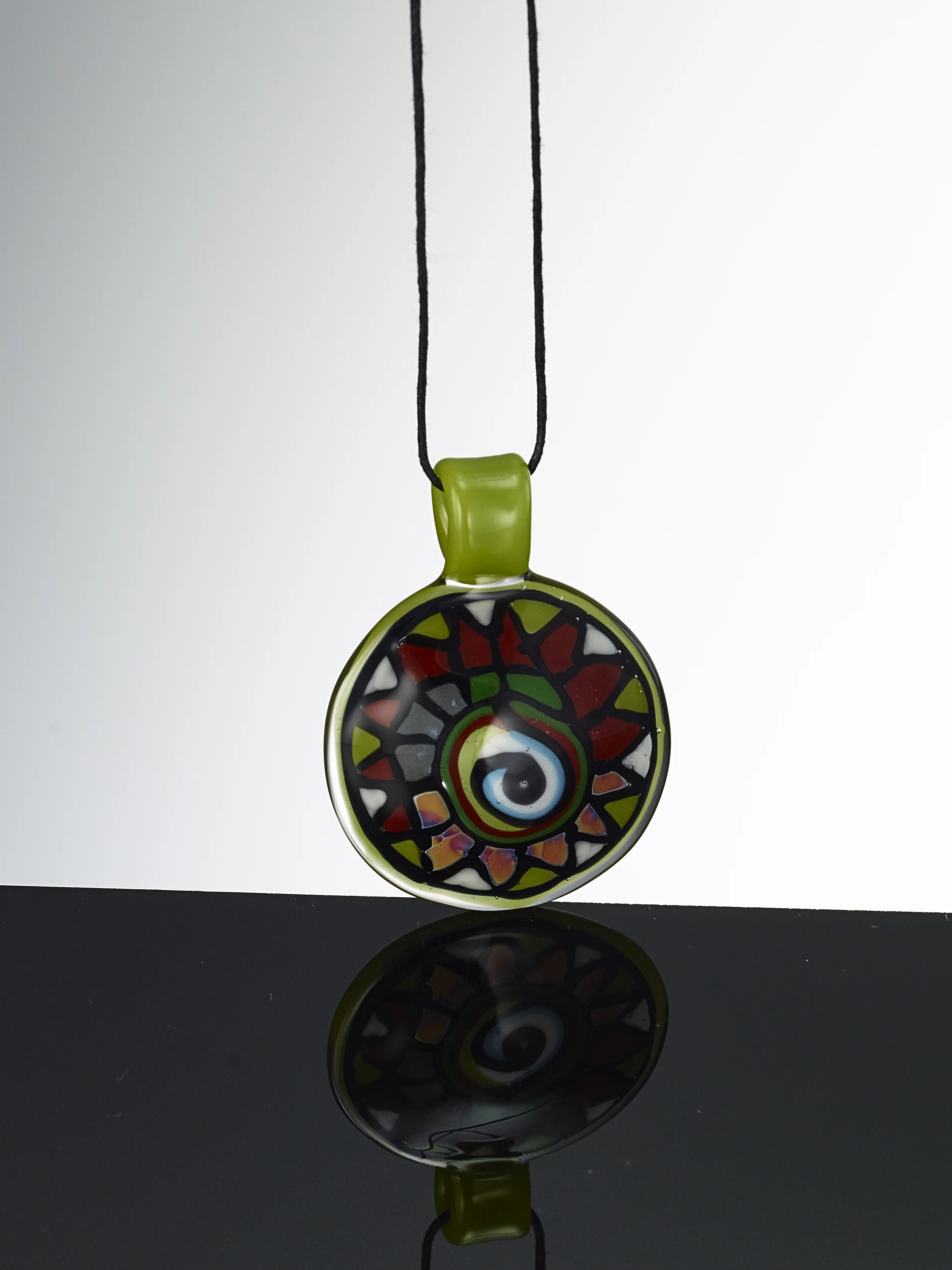 Dragon's Eye Disk Flip Pendant