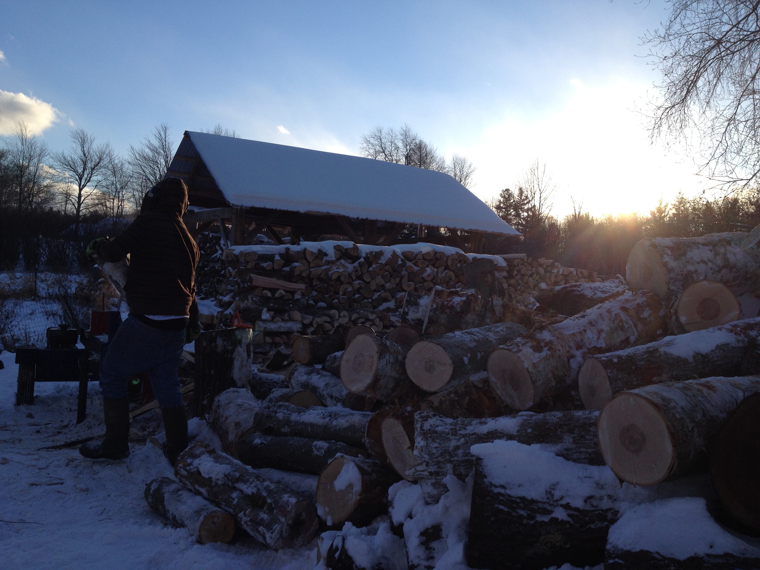 Splittin' and stackin' cordwood til the sun goes down.