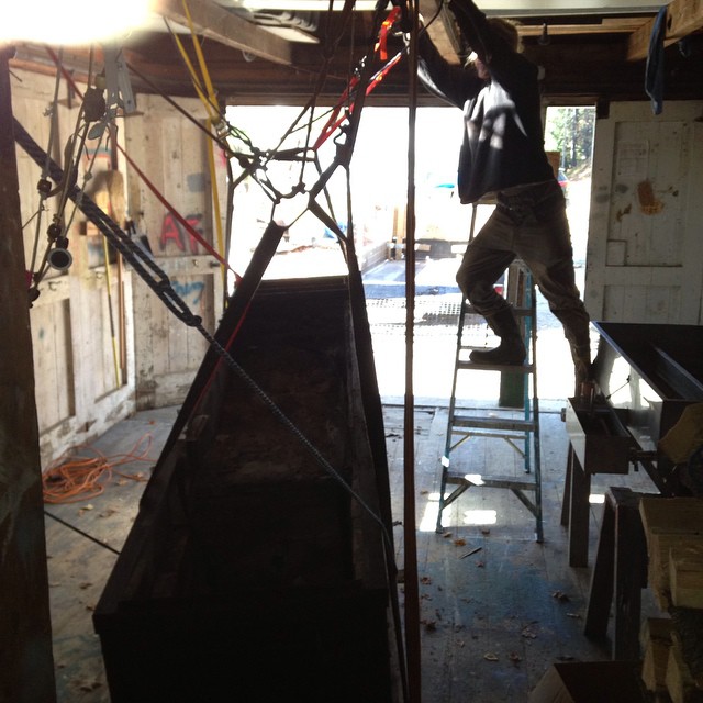 Sugar prep: Installing the ridiculously heavy cast-iron maple sap evaporator.