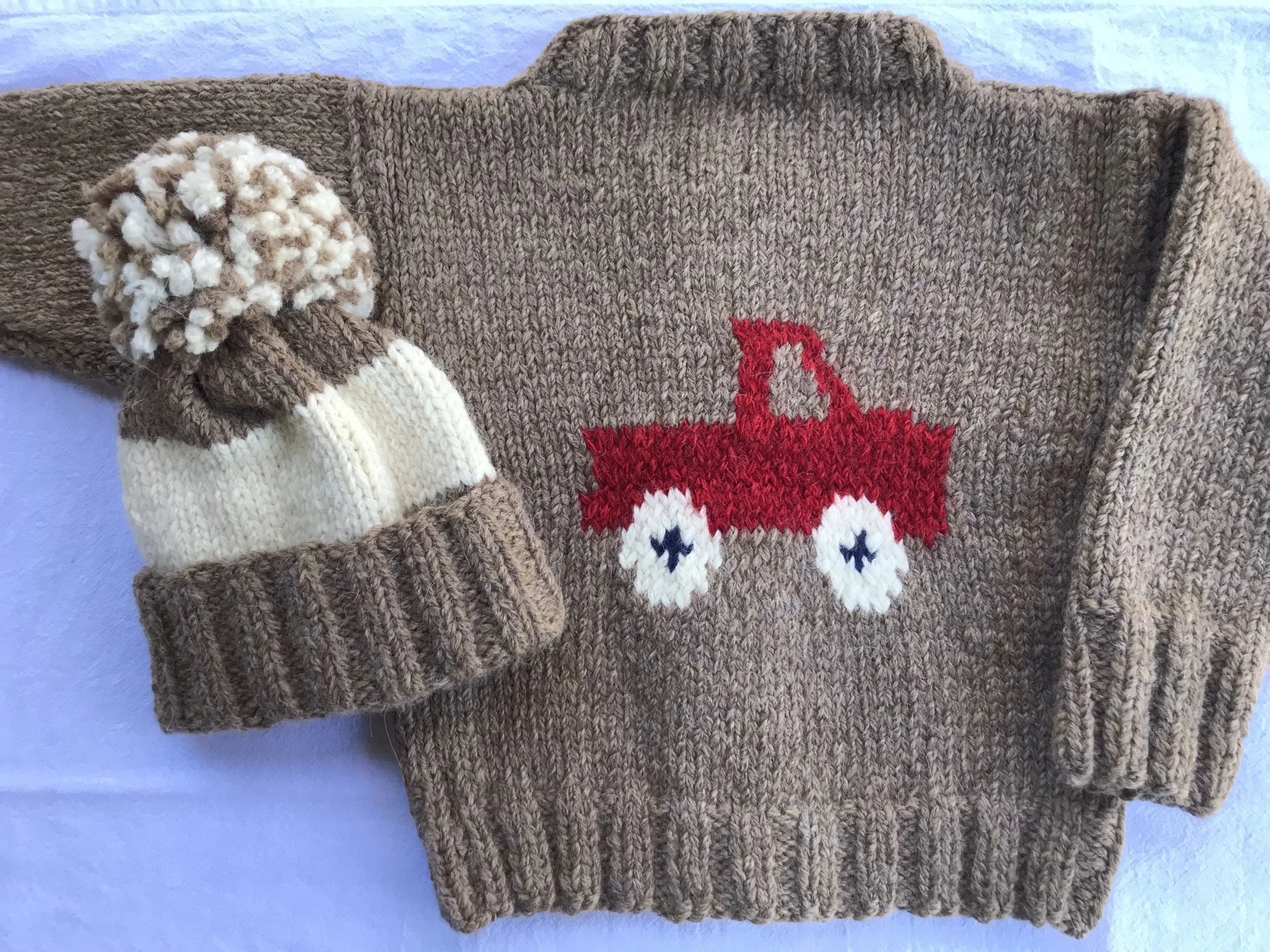 hand knit alpaca baby sweater