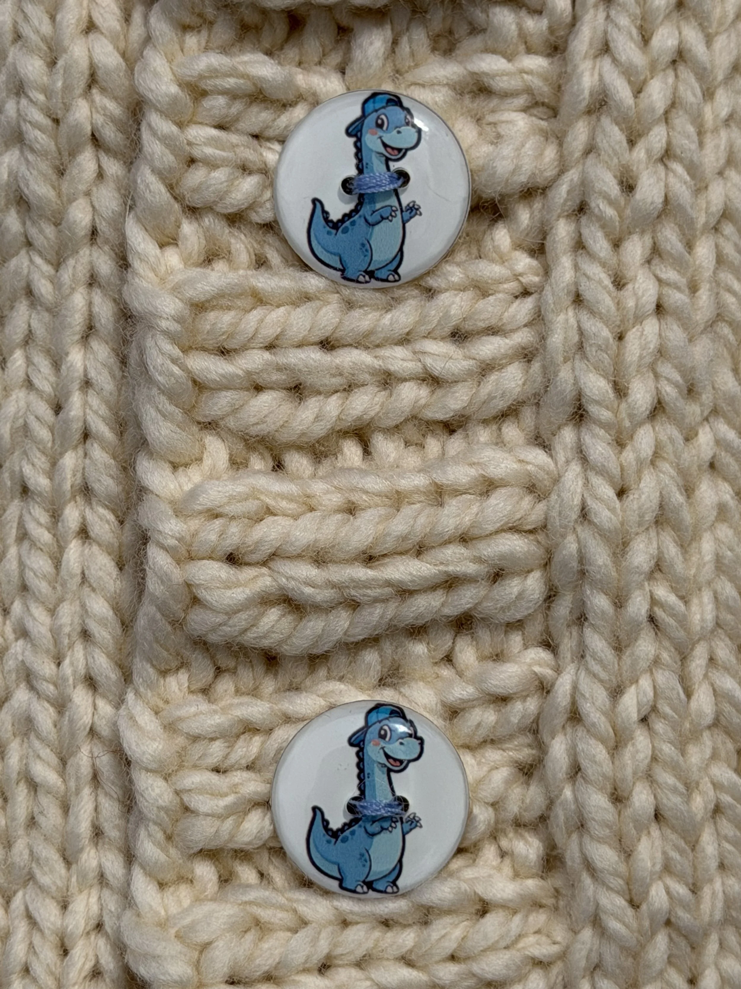 whitedinosaursweaterbuttons.jpeg