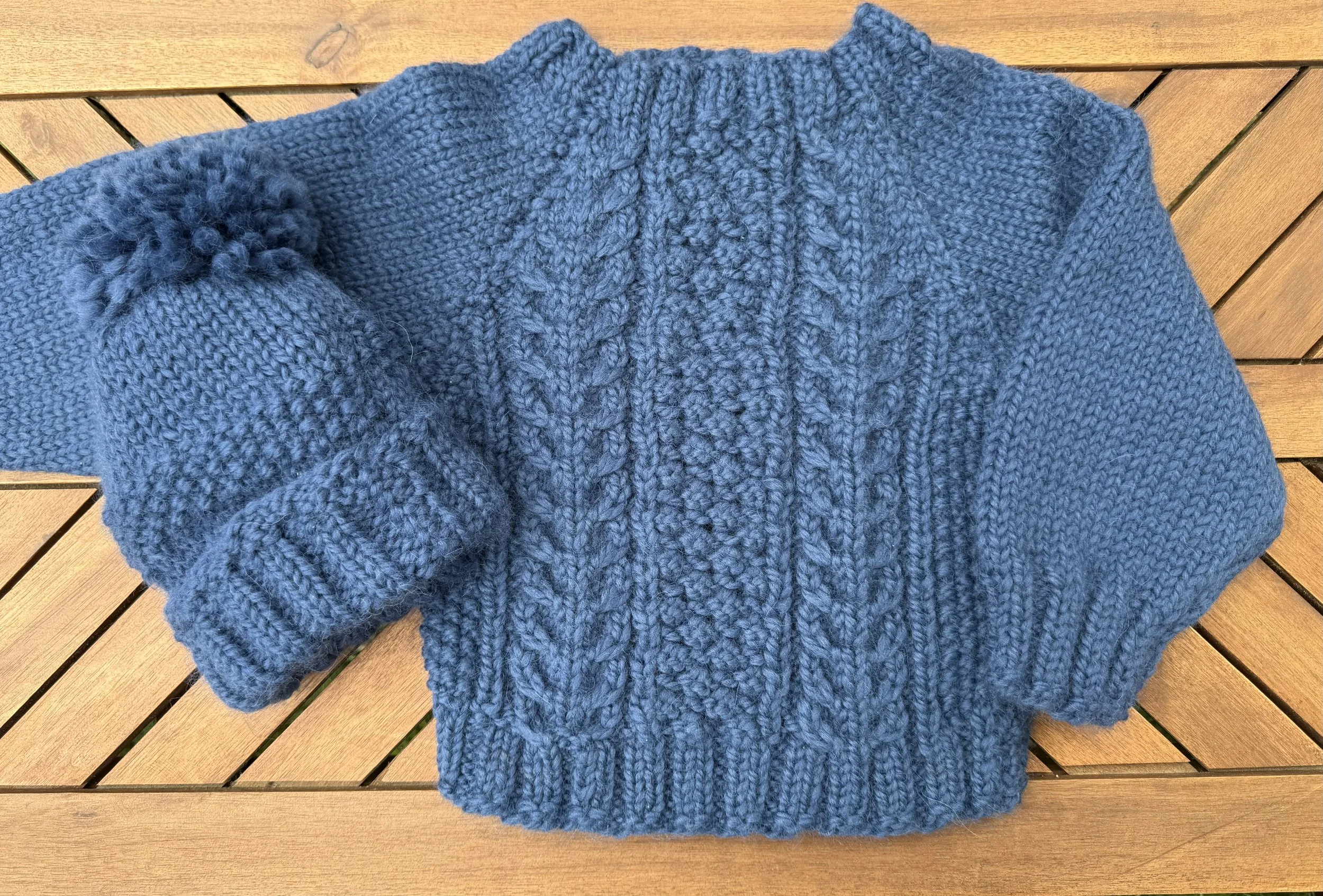 blueirishknitwithhat.jpeg