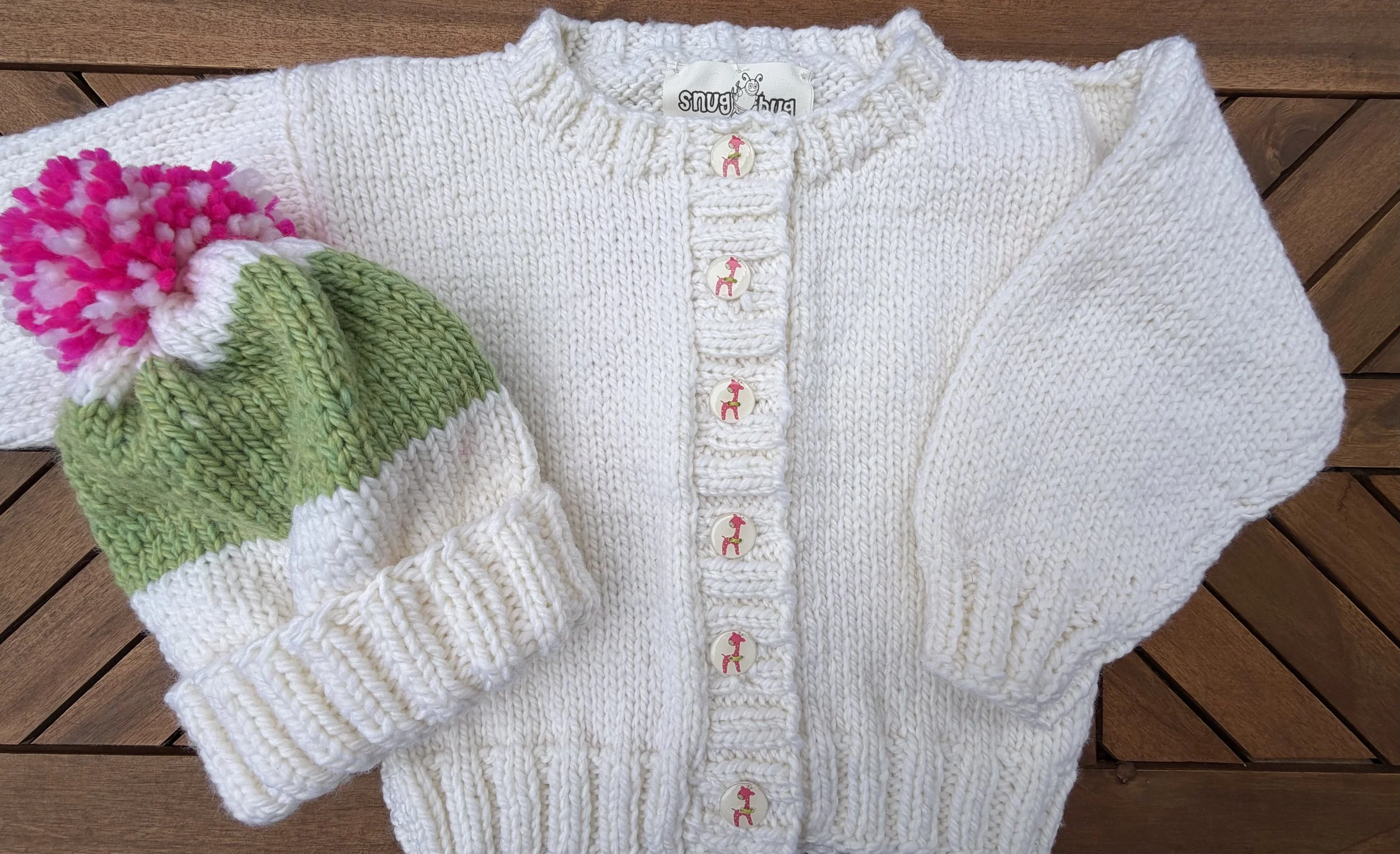 pinkgiraffesweaterfront.jpeg