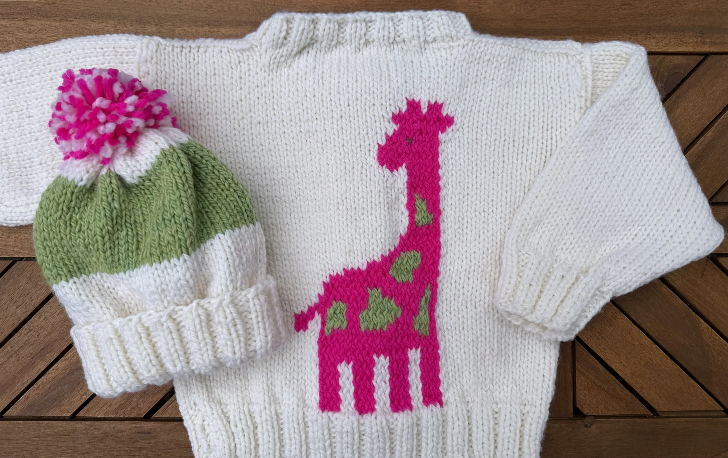 pinkgiraffesweater.jpeg