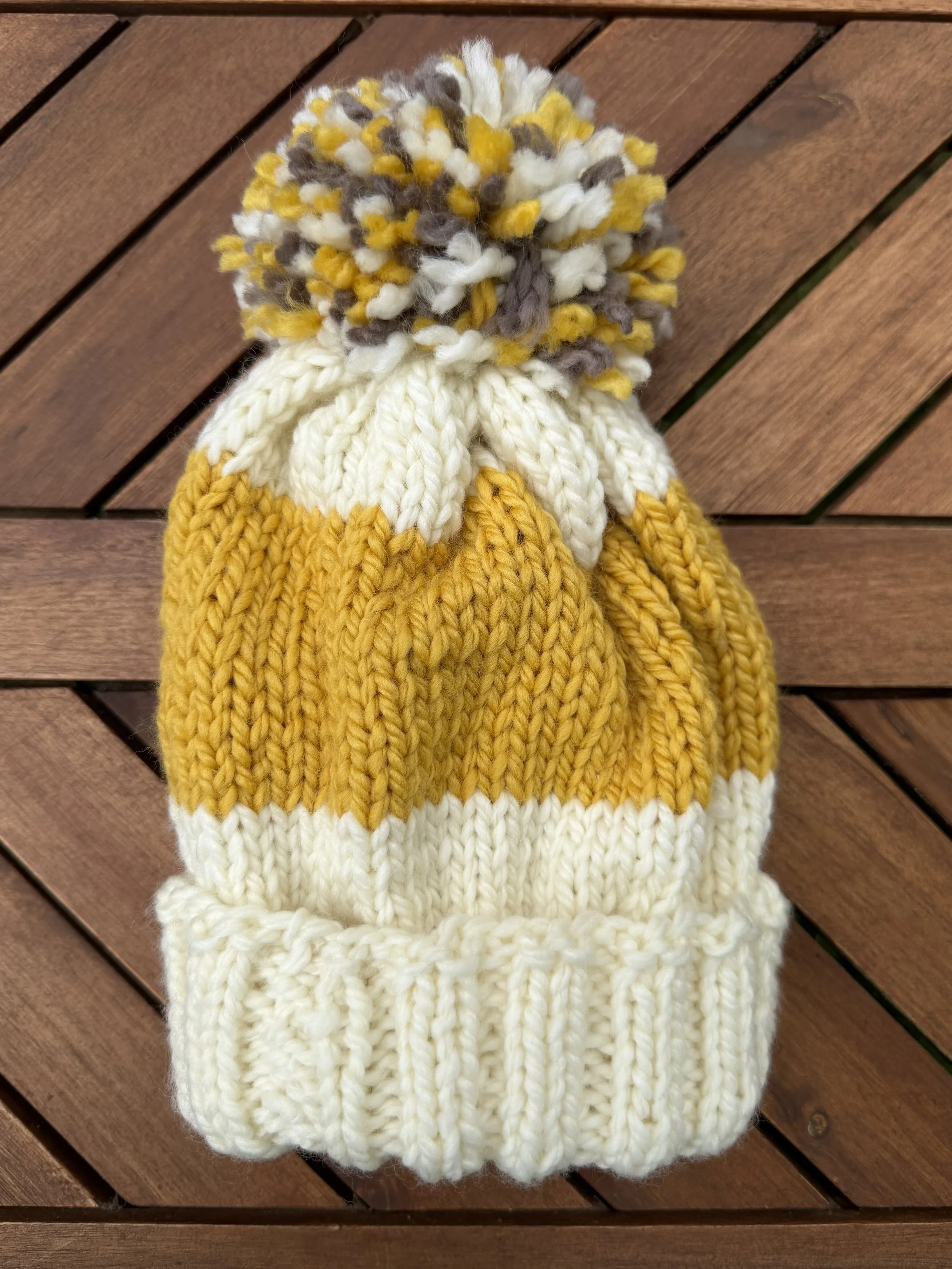 whitesweateryellowtruckhat.jpeg