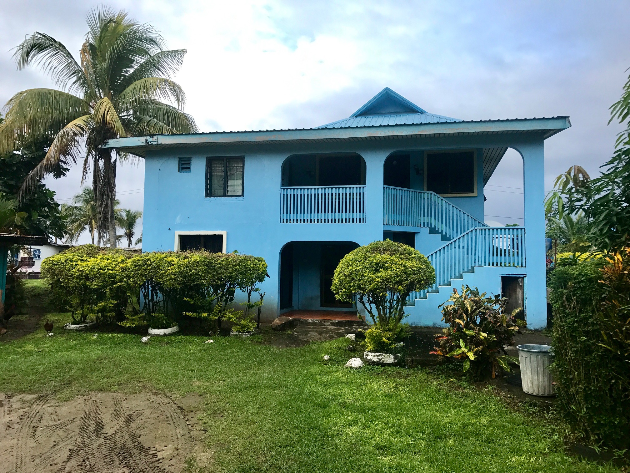 The chief came by to greet us and chat for a while. Although I didn't get a photo with him, I did get a photo of his pretty, blue home!