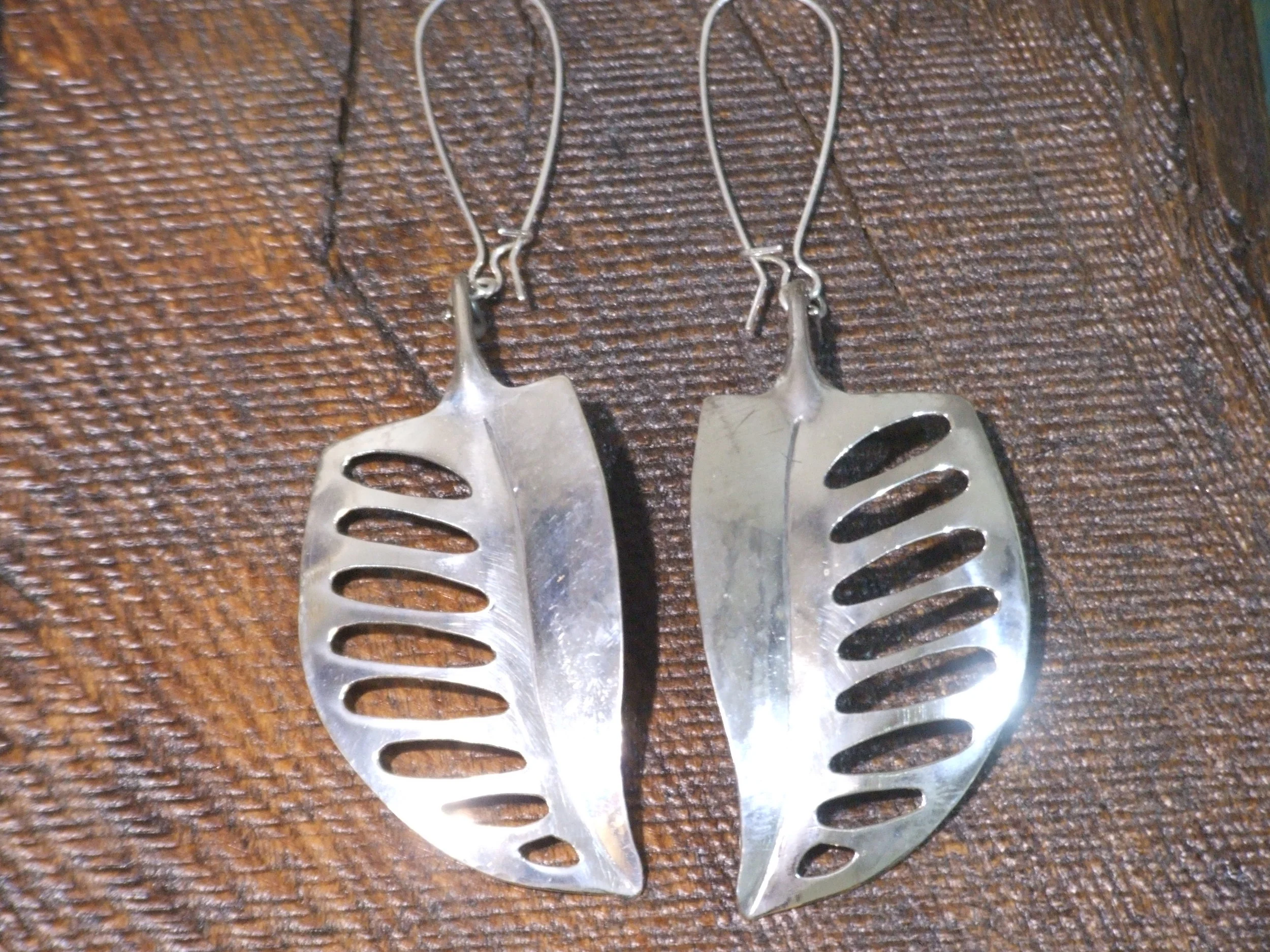 Sterling perforated leaf earrings front.jpg